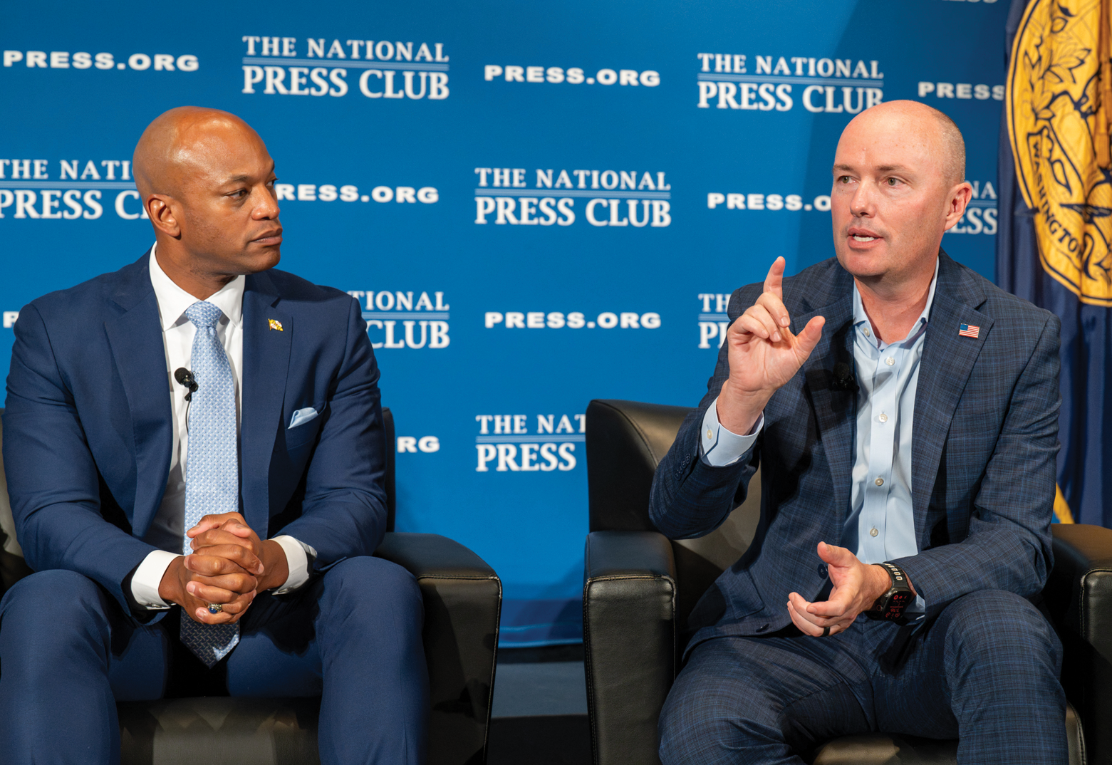 Right: Governor Wes Moore and Governor Spencer Cox at the National Press Club, 2025. (Photo by MDGovpics)